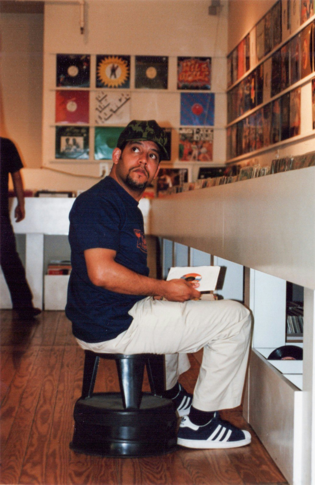 Wax Poetics founder Andre Torres at the Sound Library before Issue 2’s release party later that night, June 20, 2002.
